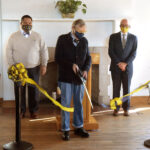 Gee cuts ribbon at The Rack
